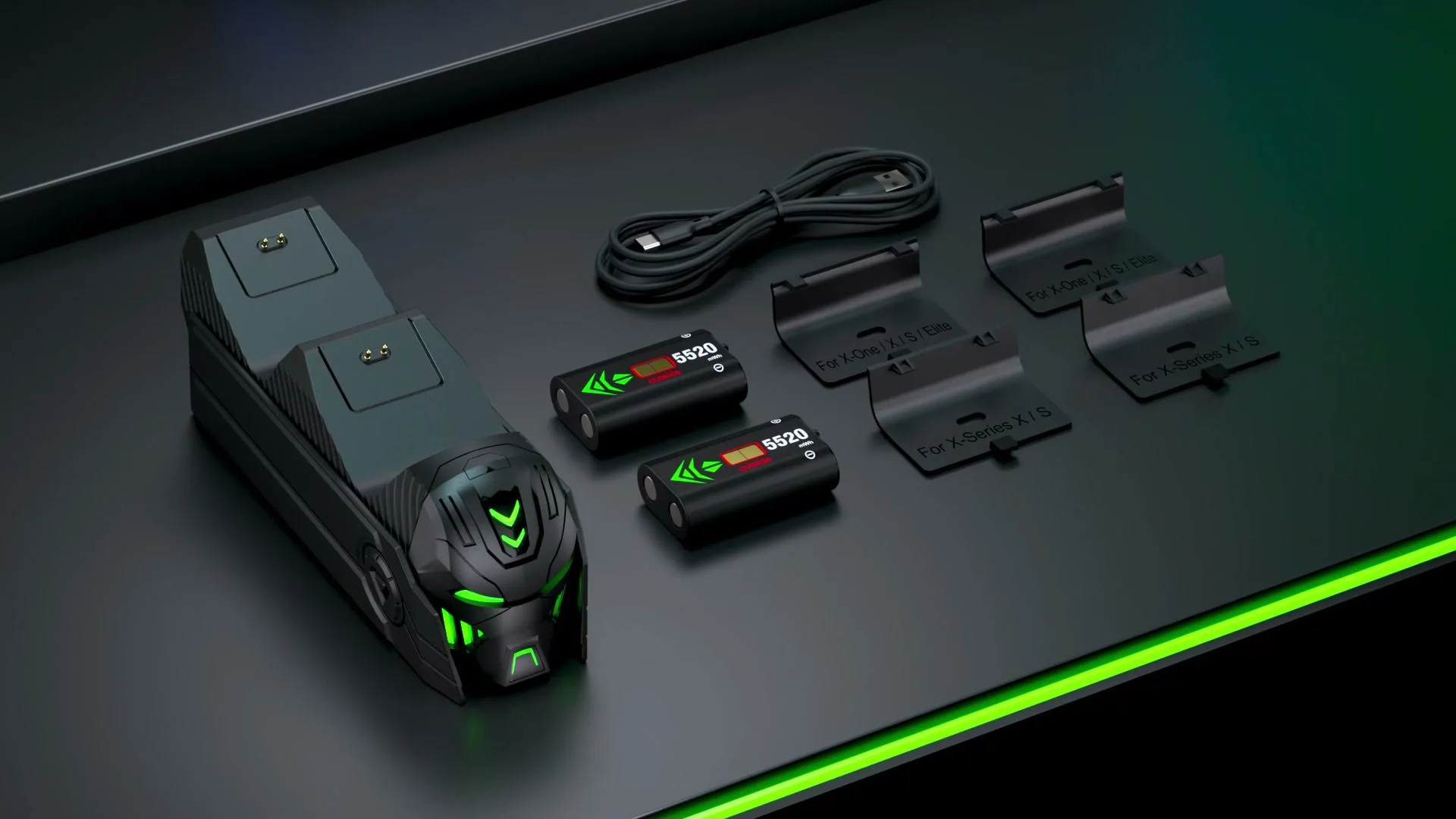 The A100 charging station laid out with two 5520 mWh battery packs, a USB-C cable and four battery covers